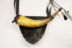 Mark Elliott SW Virgina Pouch and Horn19th Century Southwest Virginia bag and horn. The horn is about 13″ around the outside of the curve with a 2 1/2″ base plug.Photo by Mark Elliott